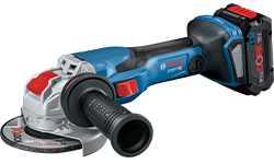 A blue Bosch Professional cordless angle grinder is lying on a table.