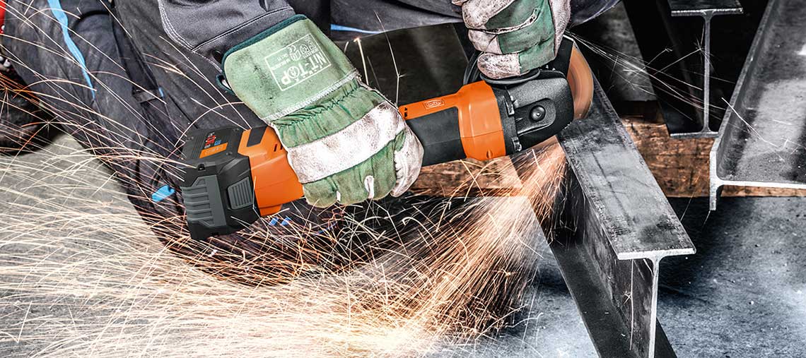 A Bosch Professional angle grinder cuts metal, sparks fly.