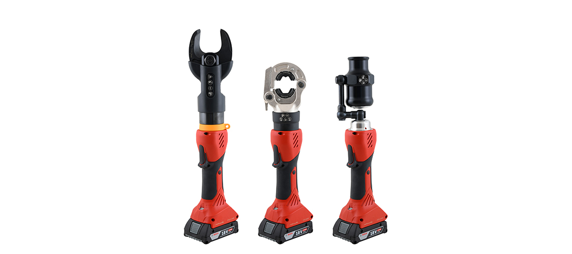 Three red hand tools with black handles stand side by side, each with different attachments.