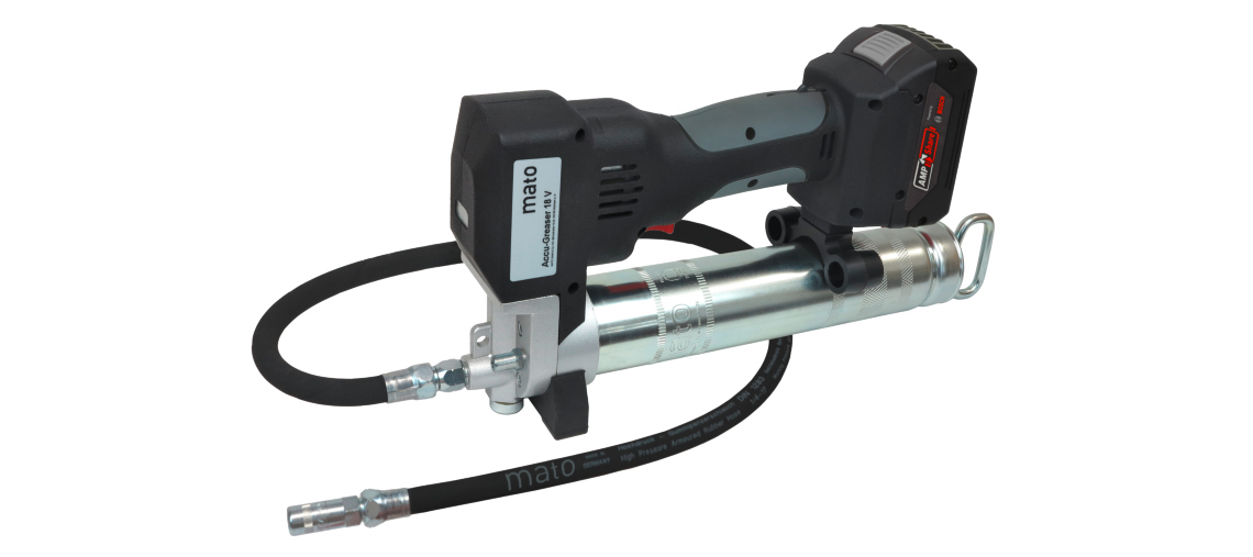 A black battery grease gun tool with a silver container.