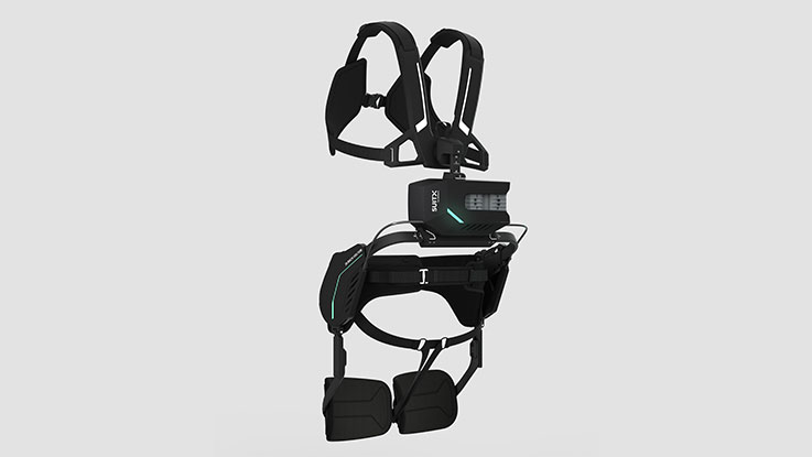 Black exoskeleton with green accents on gray background.