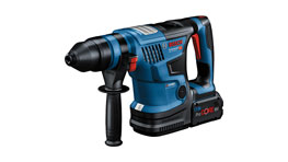 A blue Bosch Professional cordless hammer lies on a white background.