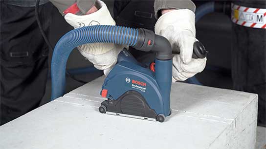 Bosch Professional tool is used on a concrete block.