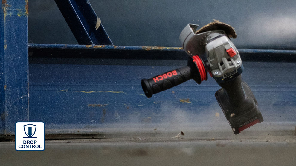 A Bosch Professional cordless angle grinder hovers above the ground.