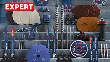 Various Bosch Professional tools and accessories in blue holders.