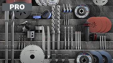 Various Bosch Professional tools on a gray wall.