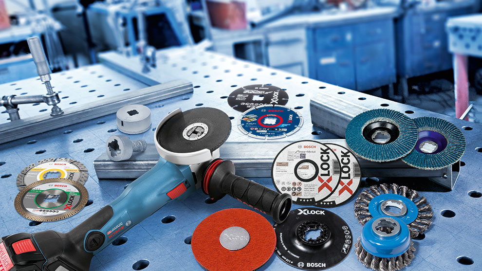 Bosch Professional cordless angle grinder with various grinding and cutting discs.